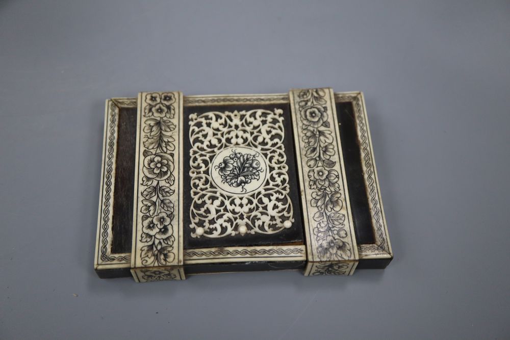 A 19th century Southern Indian horn and ivory mounted trinket box, height 7.5cm and a similar card case